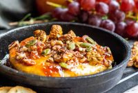 Baked Brie with Fig Jam and Toasted Nuts