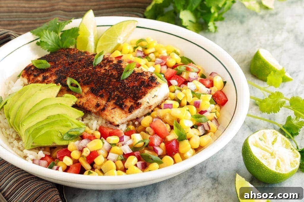 Blackened fish taco bowls with corn salsa, avocado, and rice