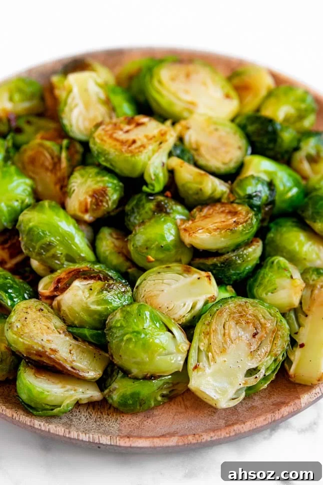 Close-up shot of a plate of sauteed Brussels sprouts