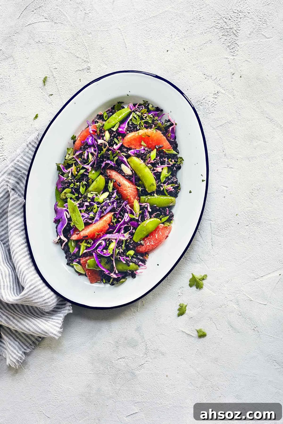 Asian black rice salad in a serving dish on the counter