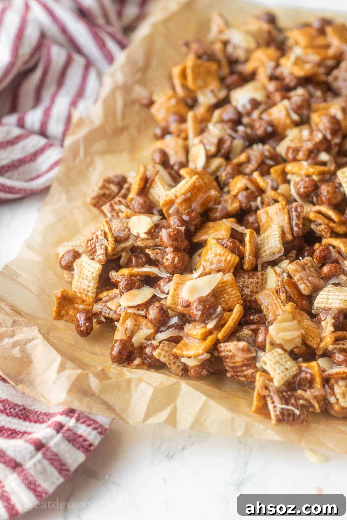 Chocolate Chex mix on parchment paper.
