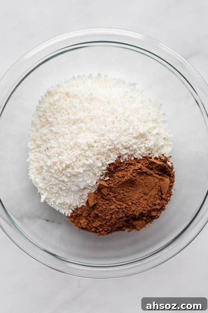 shredded coconut and cocoa powder in a mixing bowl