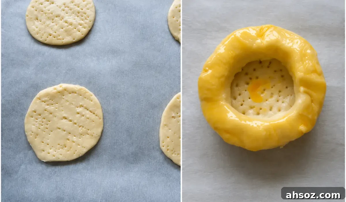 Puff pastry bases pricked with a fork and assembled with egg wash for vol au vents.