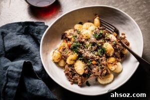 brisket ragu with gnocchi in bowl overhead
