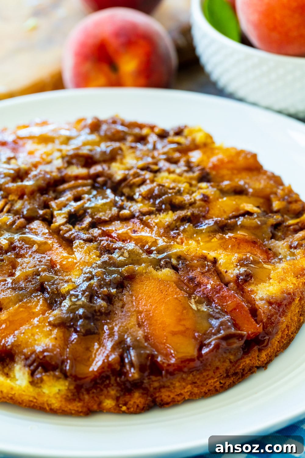 Whole Peach Upside Down Cake on a plate.