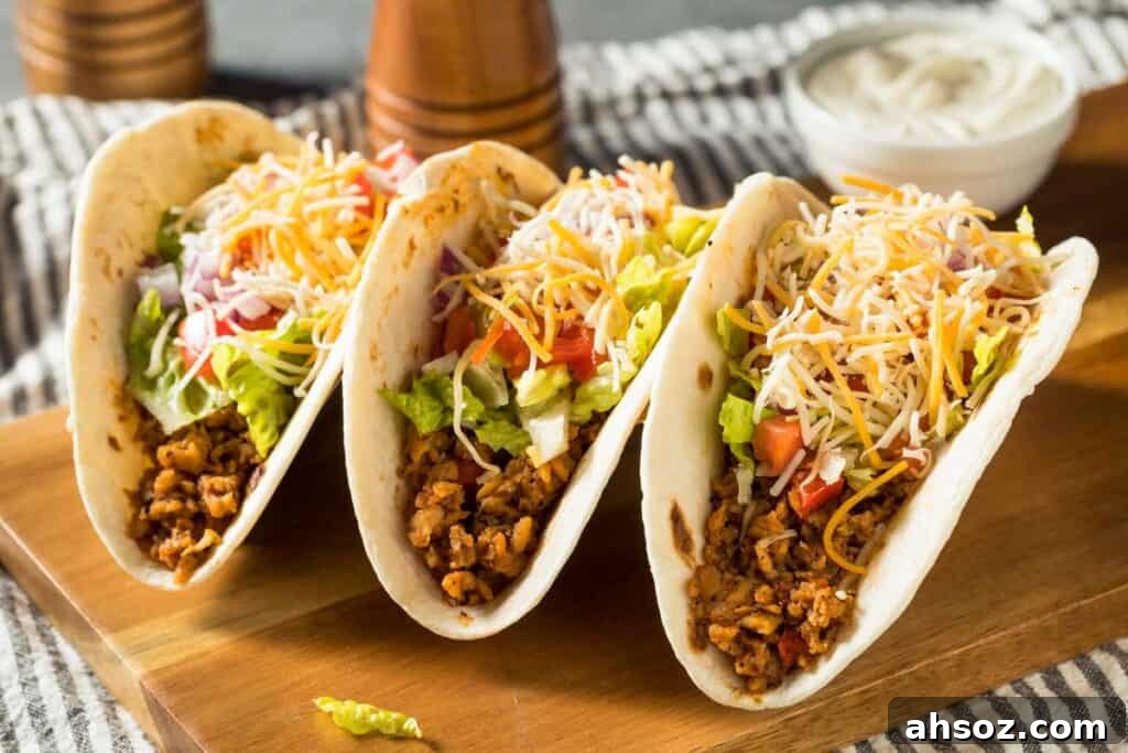 How Much Taco Meat Per Person for a Taco Bar 2 three tacos with cheese