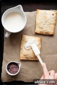 adding frosting to homemade vegan pop tarts