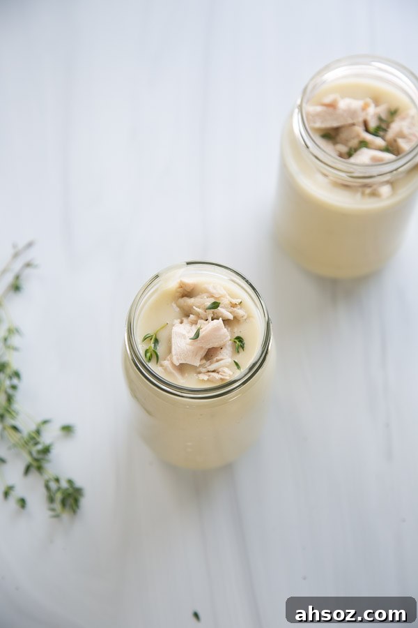two jars of gluten-free cream of chicken soup and thyme sprigs