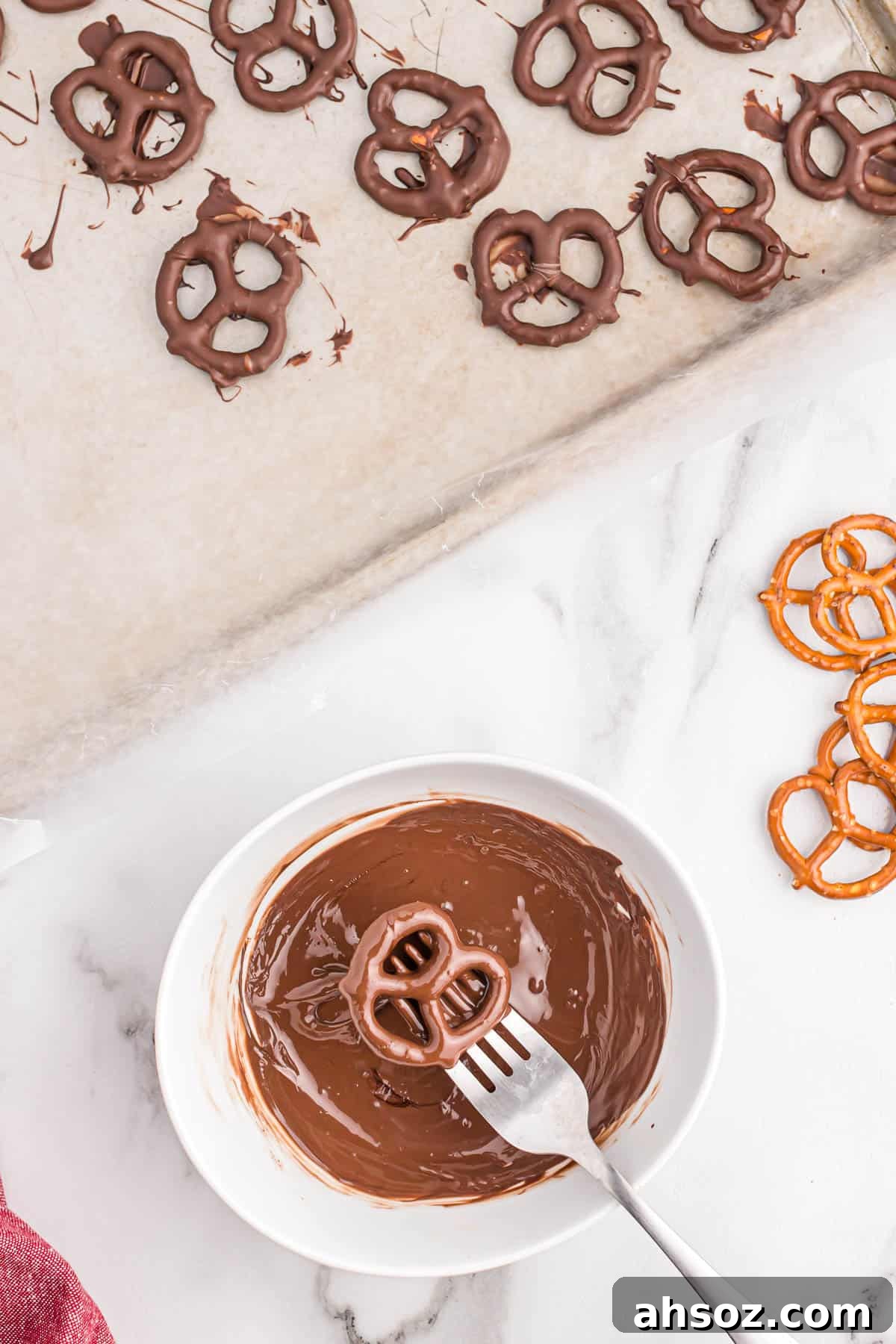 pretzel dipped in melted dark chocolate