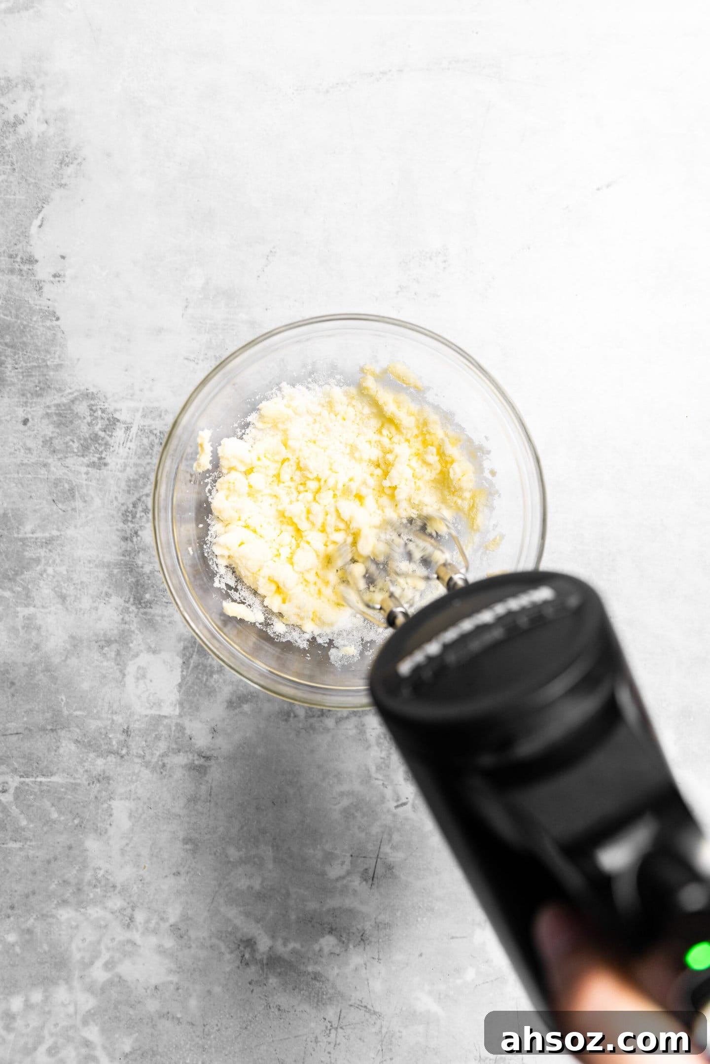 Butter and sugar being creamed together.