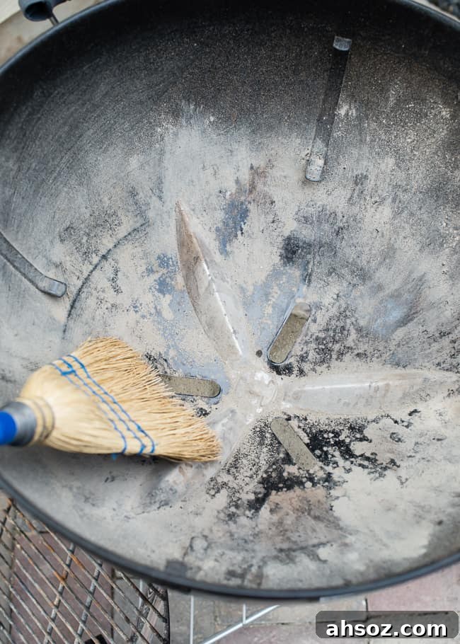 how to clean a grill - sweep ashes