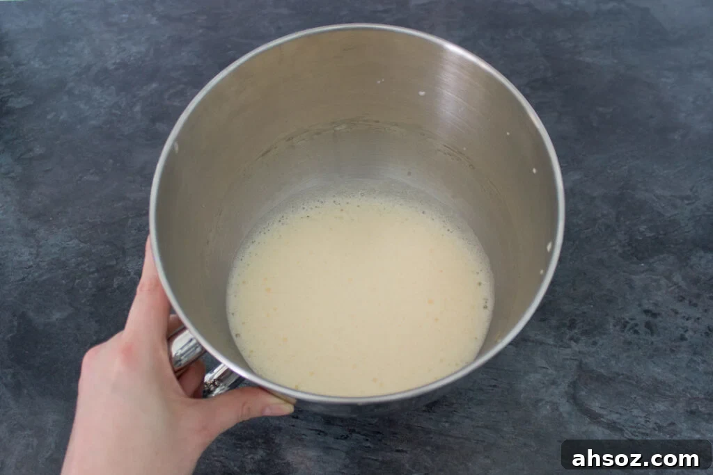 Whisked eggs in a mixing bowl.