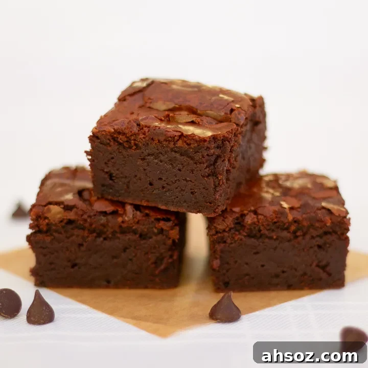 3 chocolate brownies in a tower.
