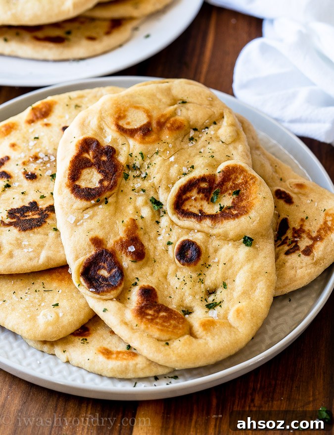 naan bread on plate with herbs and sea salt