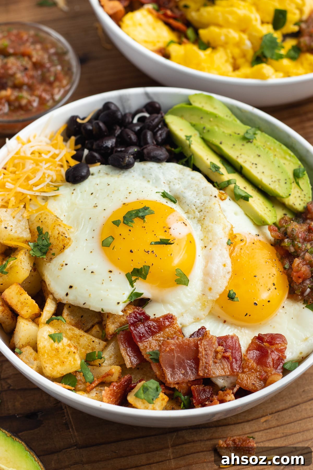 This is a picture of a breakfast bowl with fried eggs.