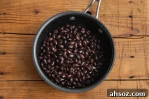 This is a picture of black beans in a pot.