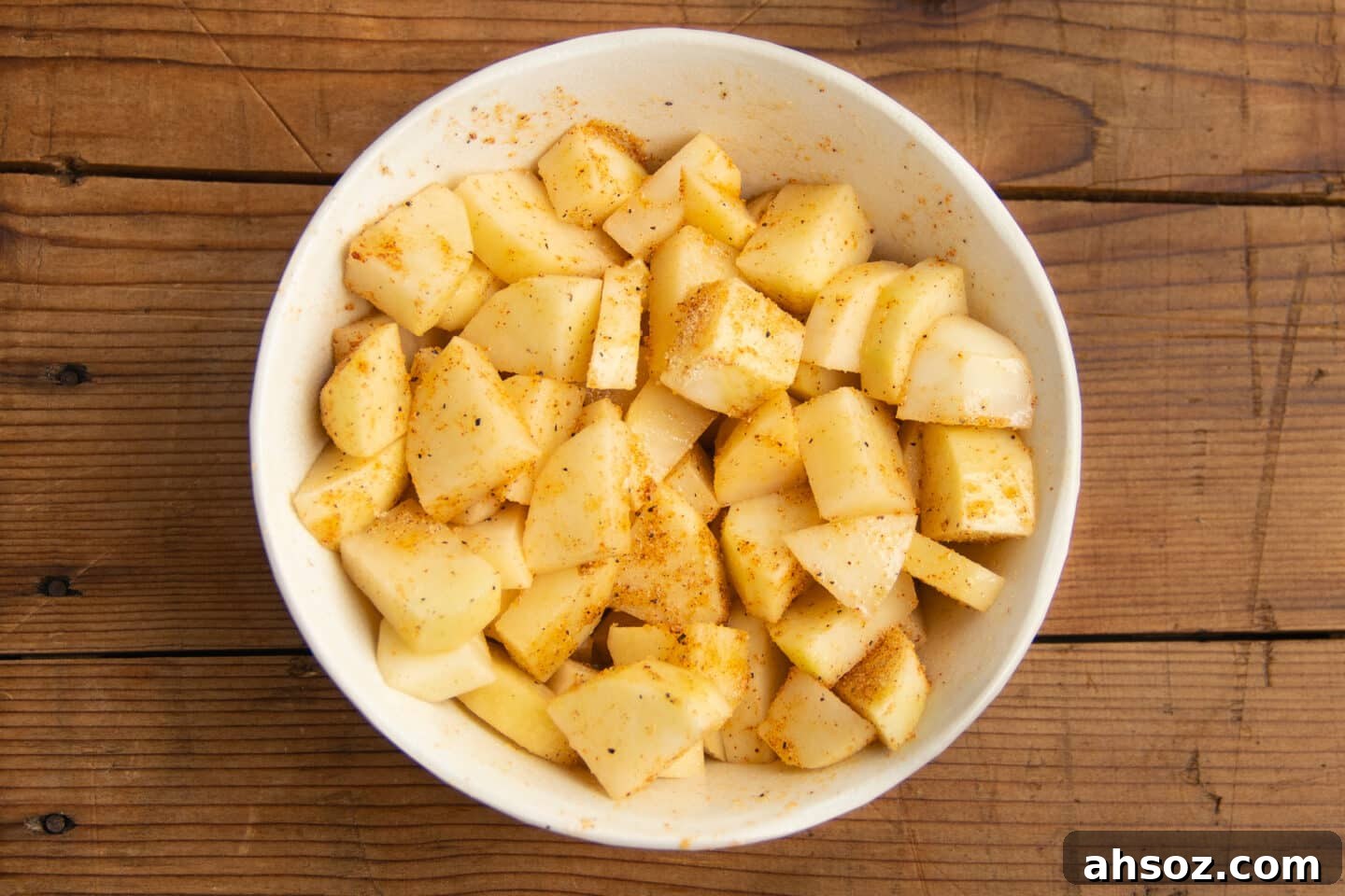 This is a photo of the potatoes seasoned with spices.
