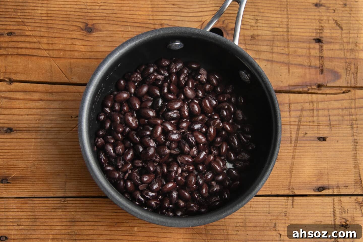 This is a picture of black beans in a pot.