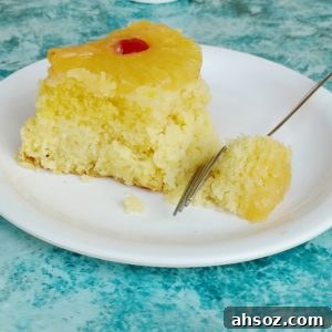 Slice of pineapple upside down cake served after baking