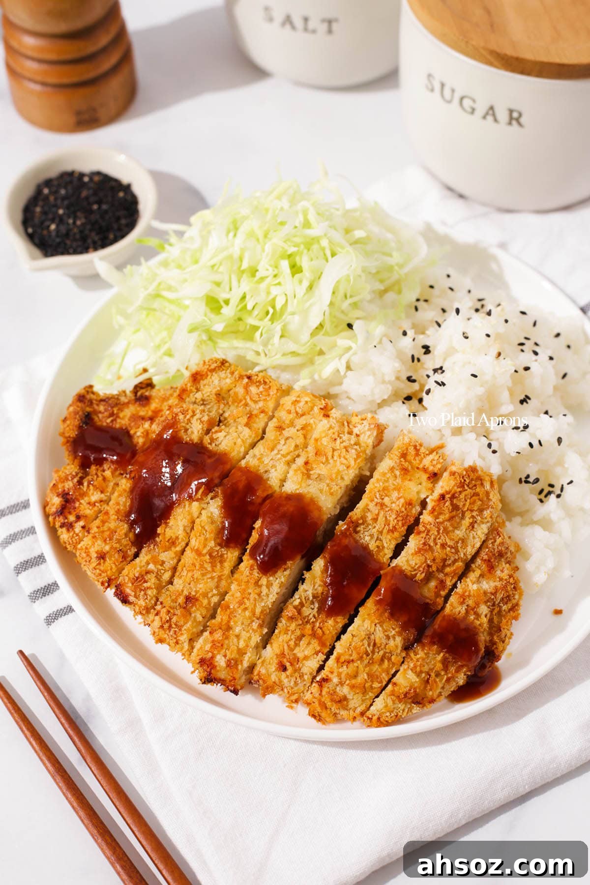Air fryer chicken katsu served with sauce.