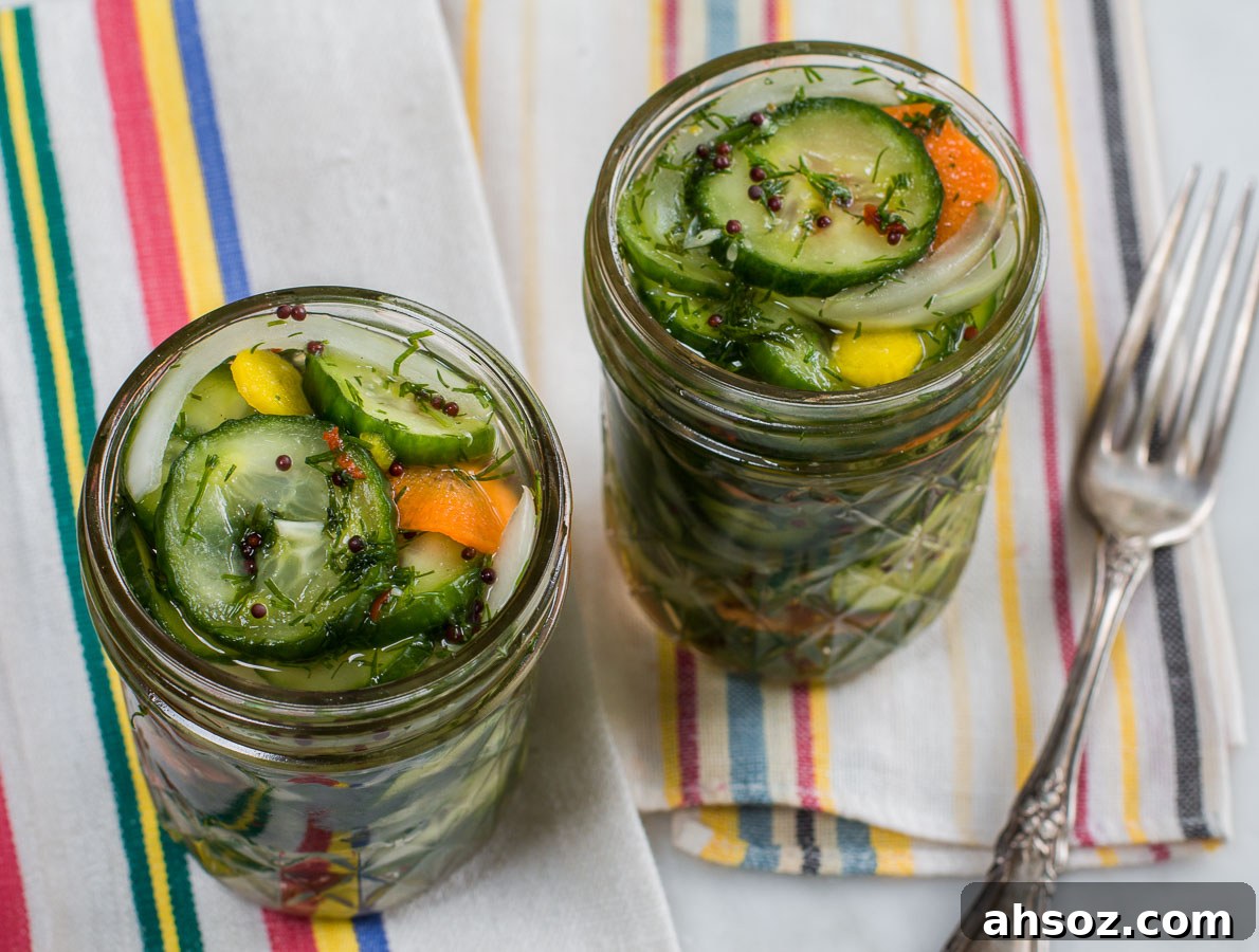 Homemade refrigerator pickles with carrots, onions, garlic, and dill