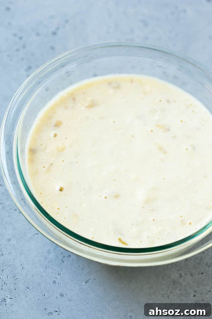 A bowl of banana pancake batter.