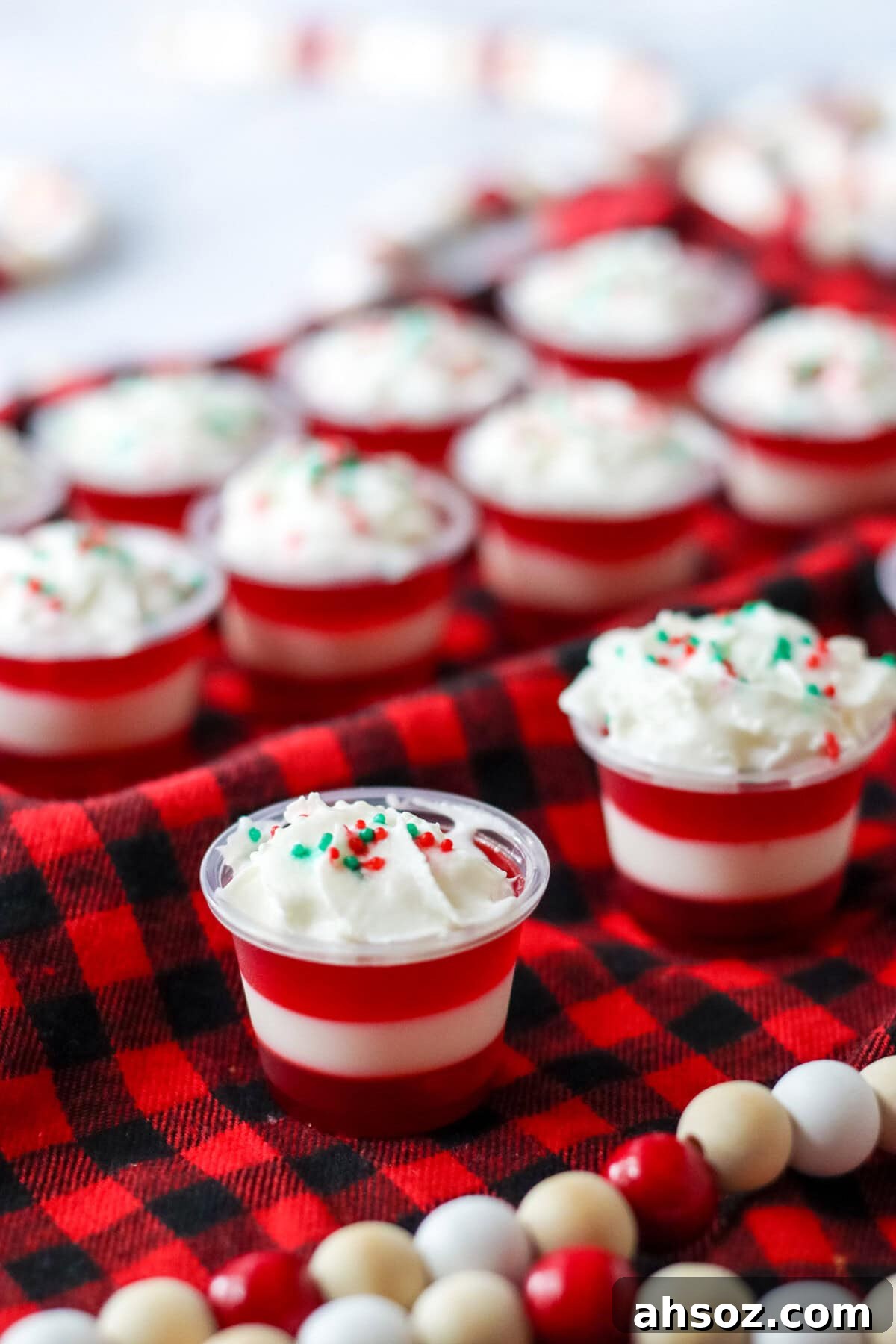 Candy Cane Jello Shots on red and black fabric