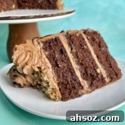 A closeup of a slice of moist chocolate cinnamon cake