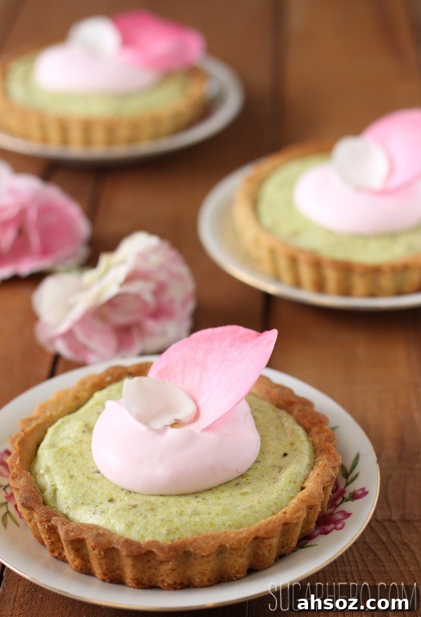 Pistachio rose tarts with raspberry jam and rose whipped cream
